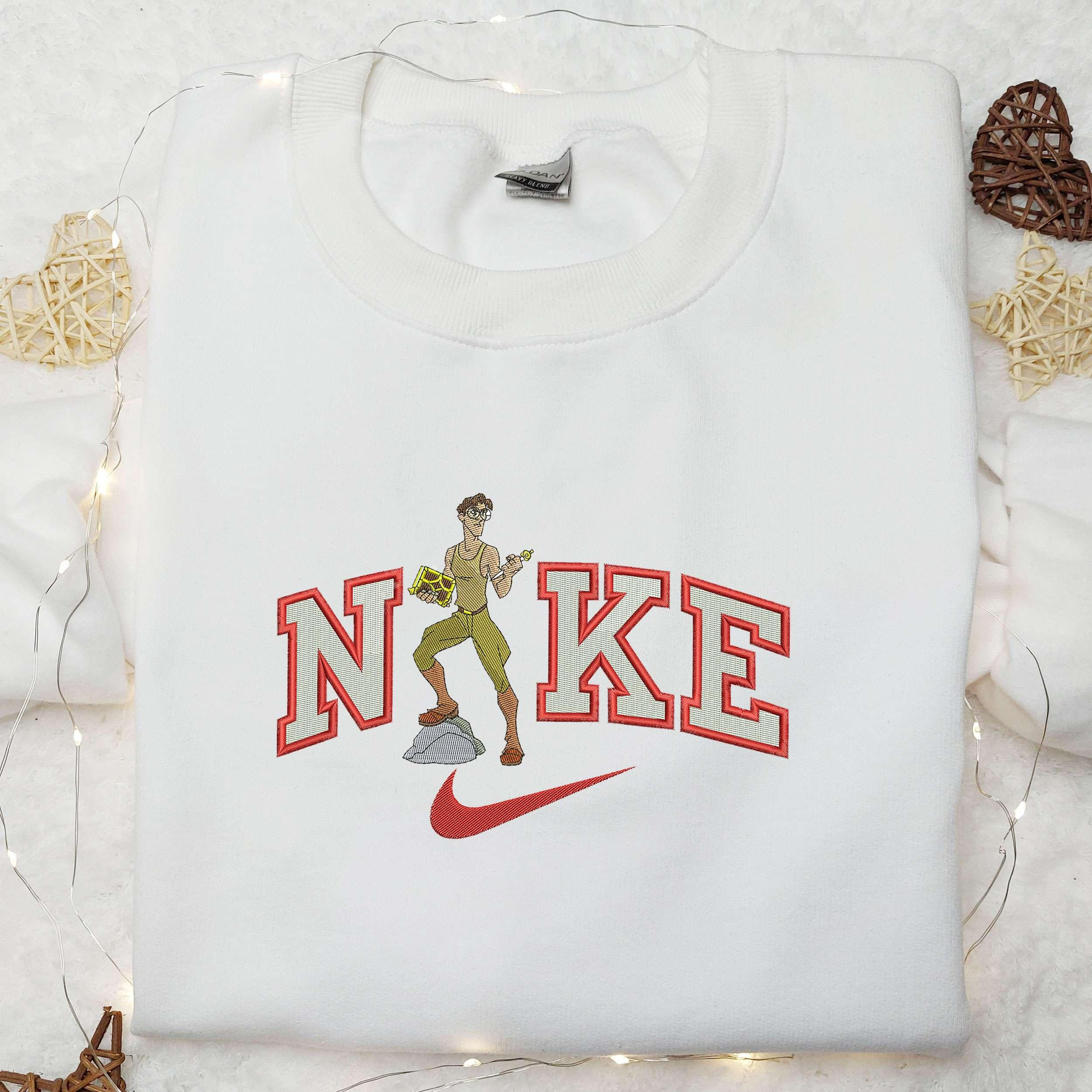 Atlantis x Nike Embroidered Shirt The Lost Empire Embroidered Shirt Cartoon Embroidered Shirt