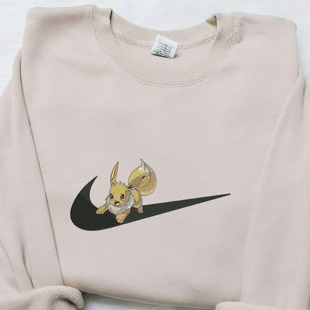 Eeve X Swoosh Embroidered Hoodie Pokemon Embroidered Shirt Custom Embroidered Shirt 1 , Anime Embroidered T-shirt Sweatshirt Hoodie, Inspired Anime Movie, Best Gift for Anime Fans