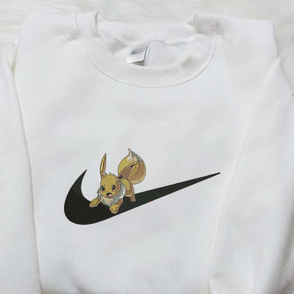 Eevew X Nike Swoosh , Anime Embroidered T-shirt Sweatshirt Hoodie, Inspired Anime Movie, Best Gift for Anime Fans