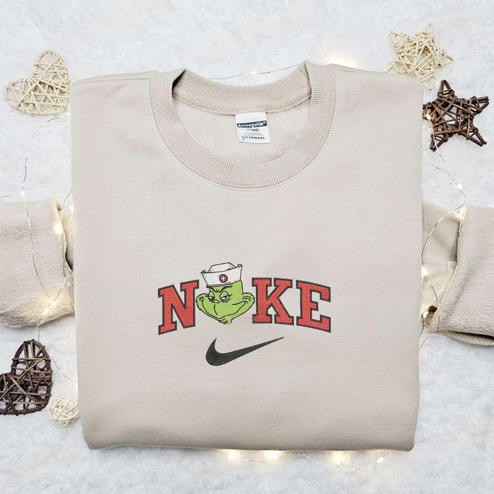 The Villian Grinch Nurse x Nike Christmas Embroidered Sweatshirt Movie Merry Christmas Embroidered Shirt Best Christmas Day Gift Ideas